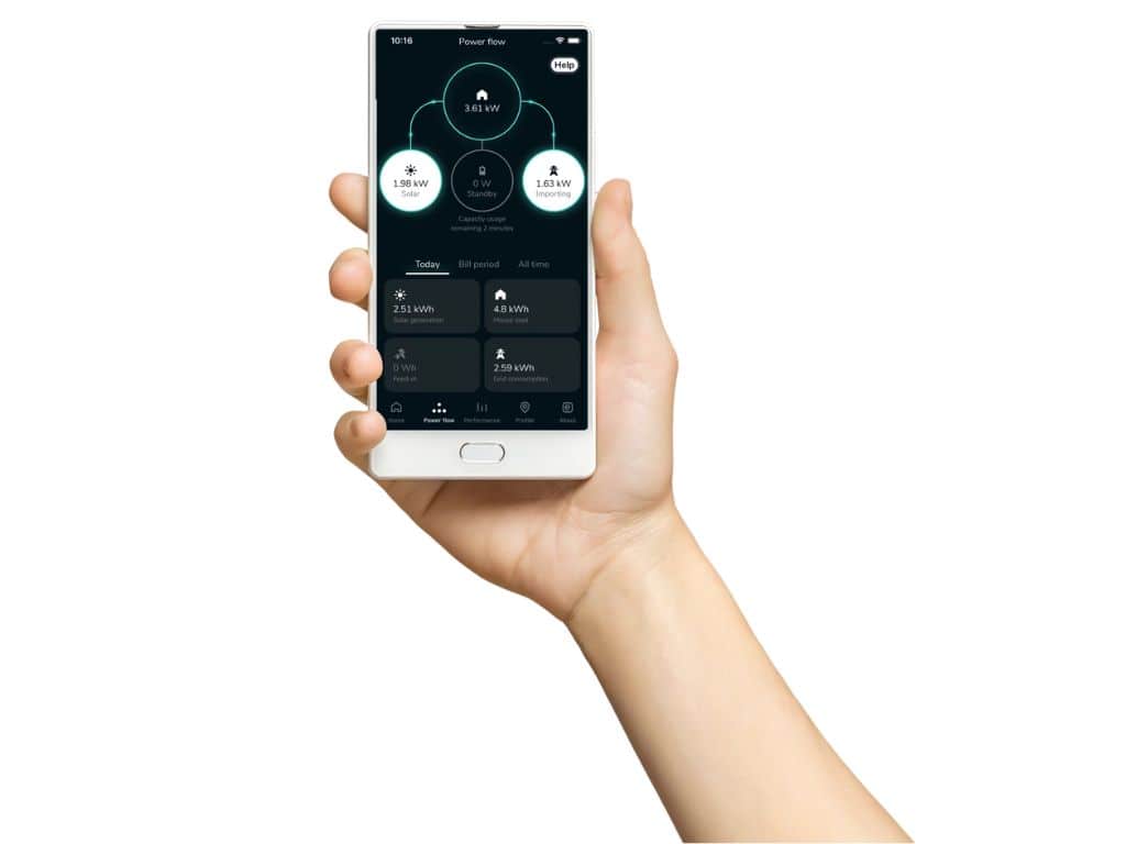 hand holding a phone with power flow app on display