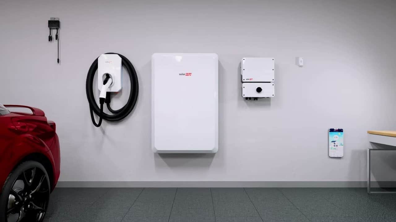 SolarEdge home battery and inverter mounted on a wall in the garage