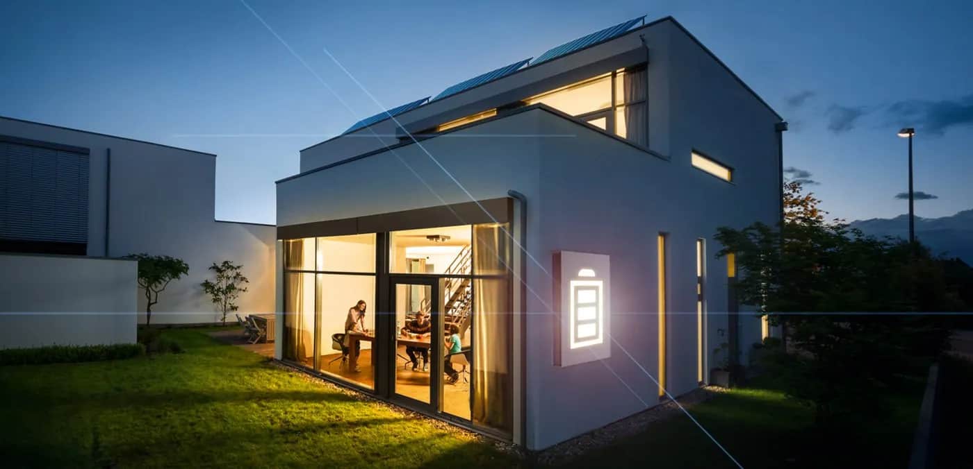 contemporary home at sunset with rooftop solar panels