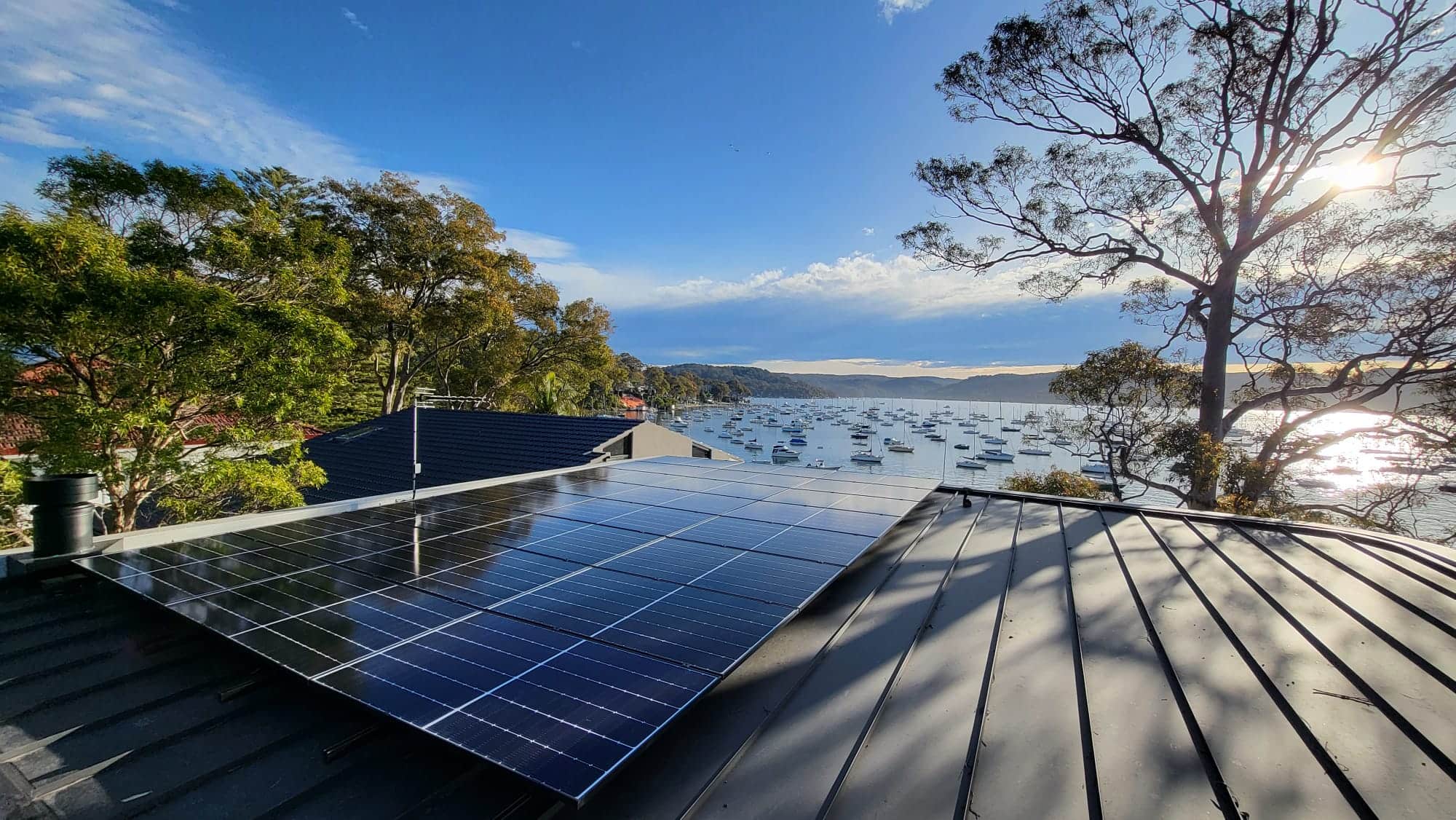 dad with little girl looking at home with solar