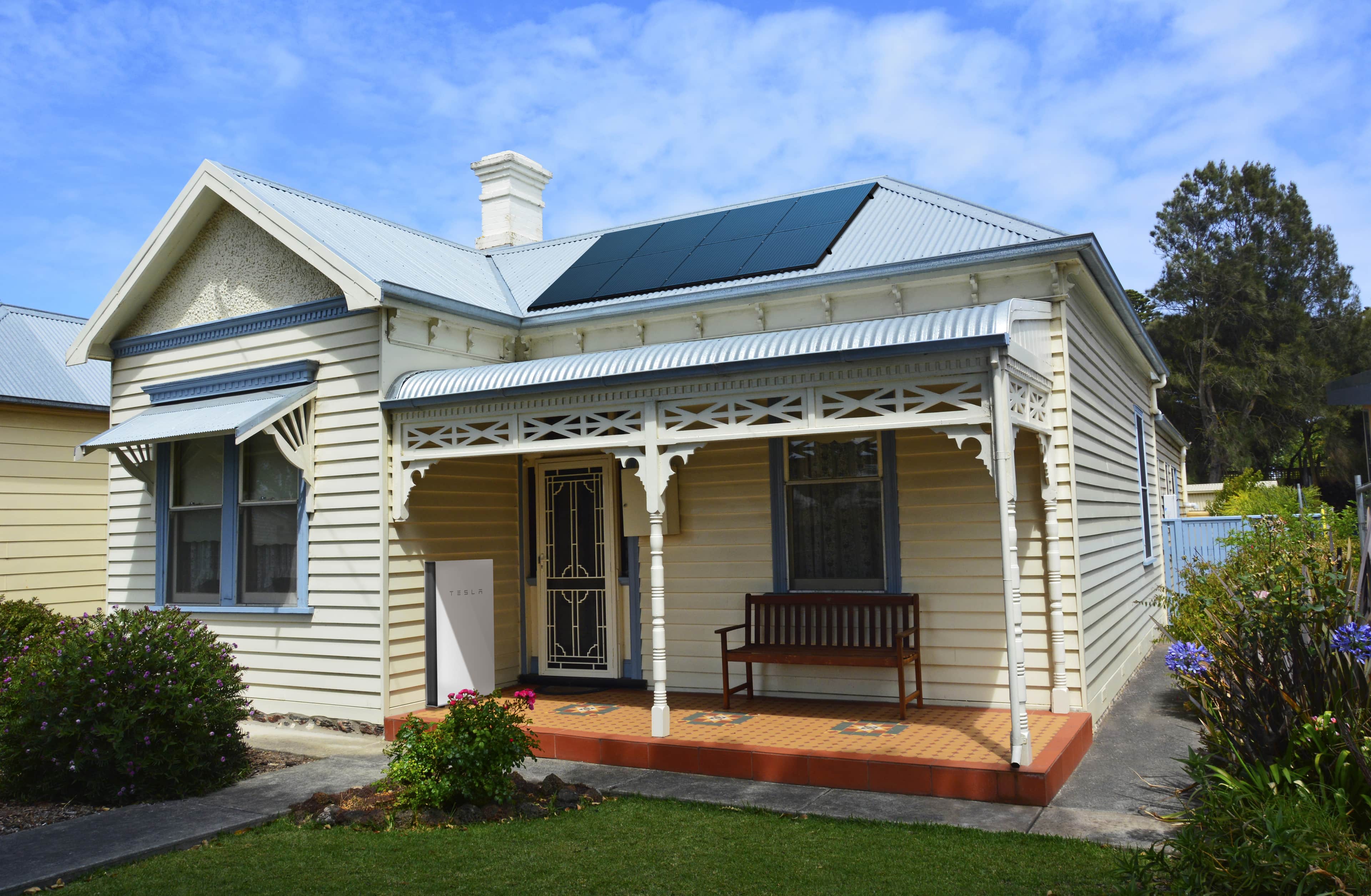 home with solar panels and solar battery