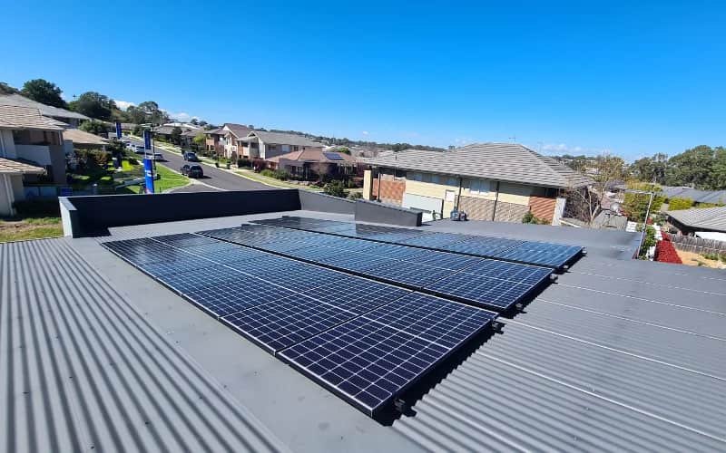 8kW solar panel system installed on a tin roof