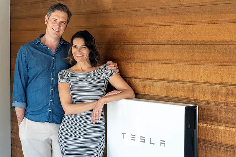 Homeowners with their Tesla Powerwall 2