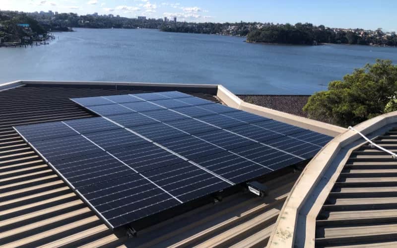 6.6 kW solar panel system installed on metal roof