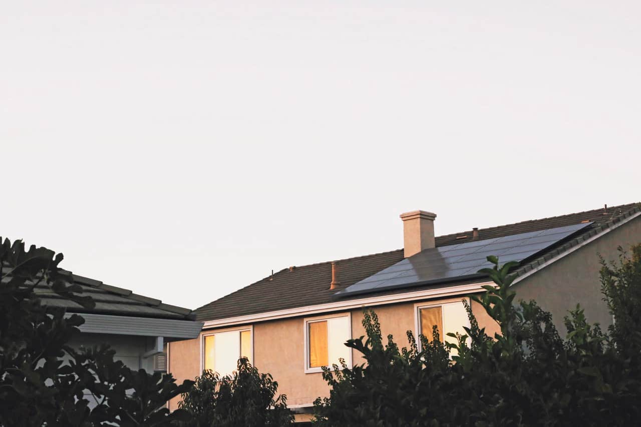 modern home with a solar panel on the roof