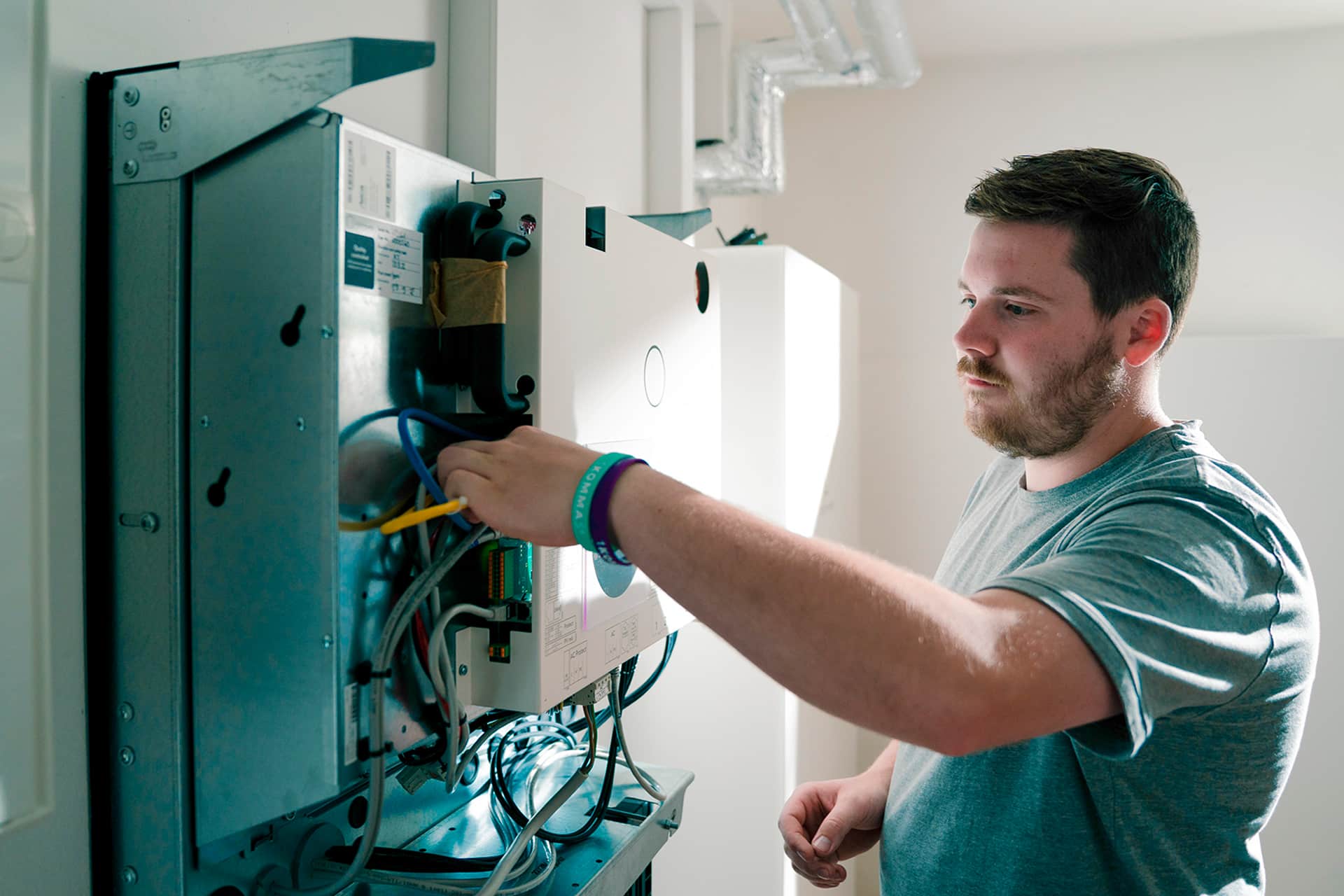 a man configuring a meter box
