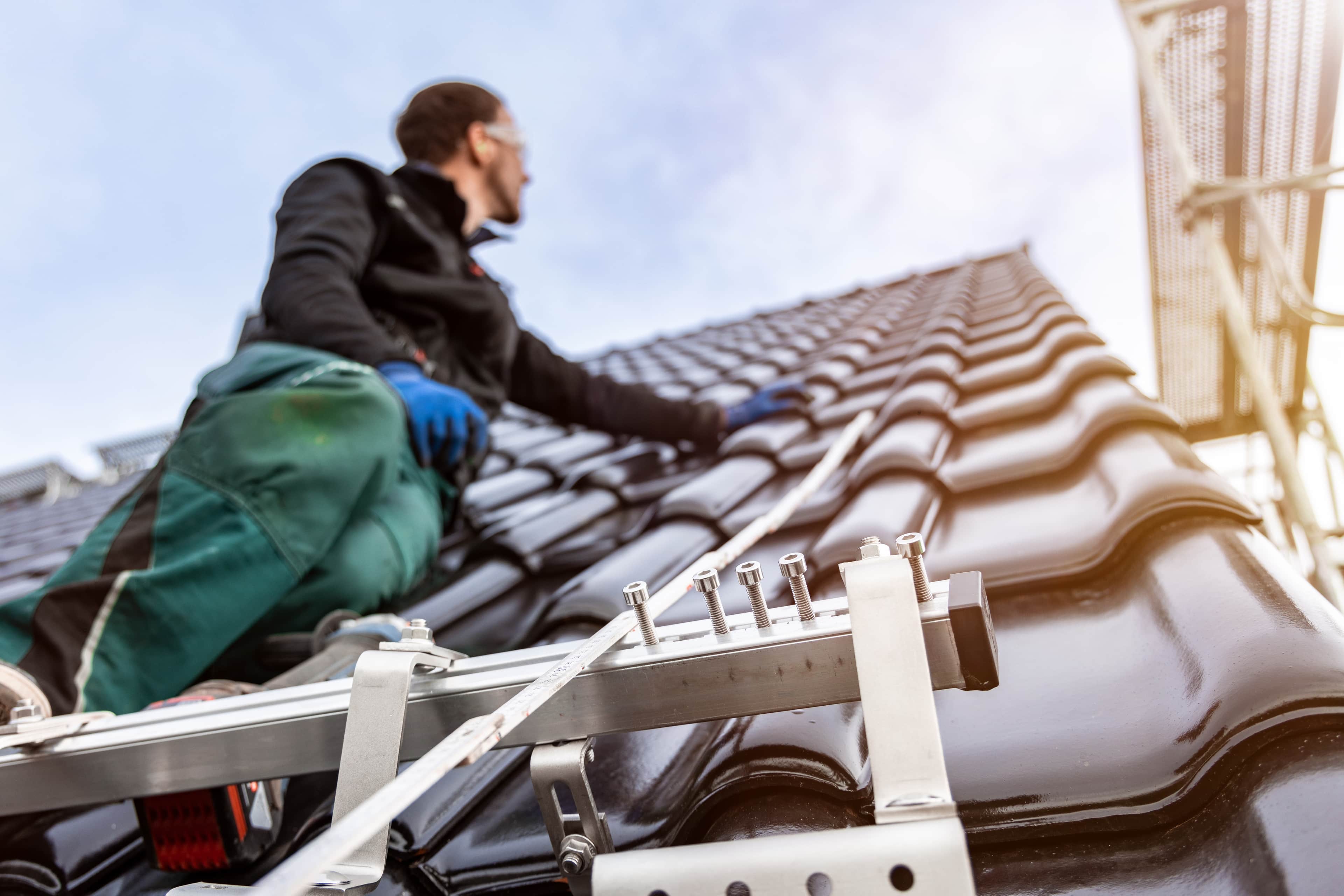 a man on a roof